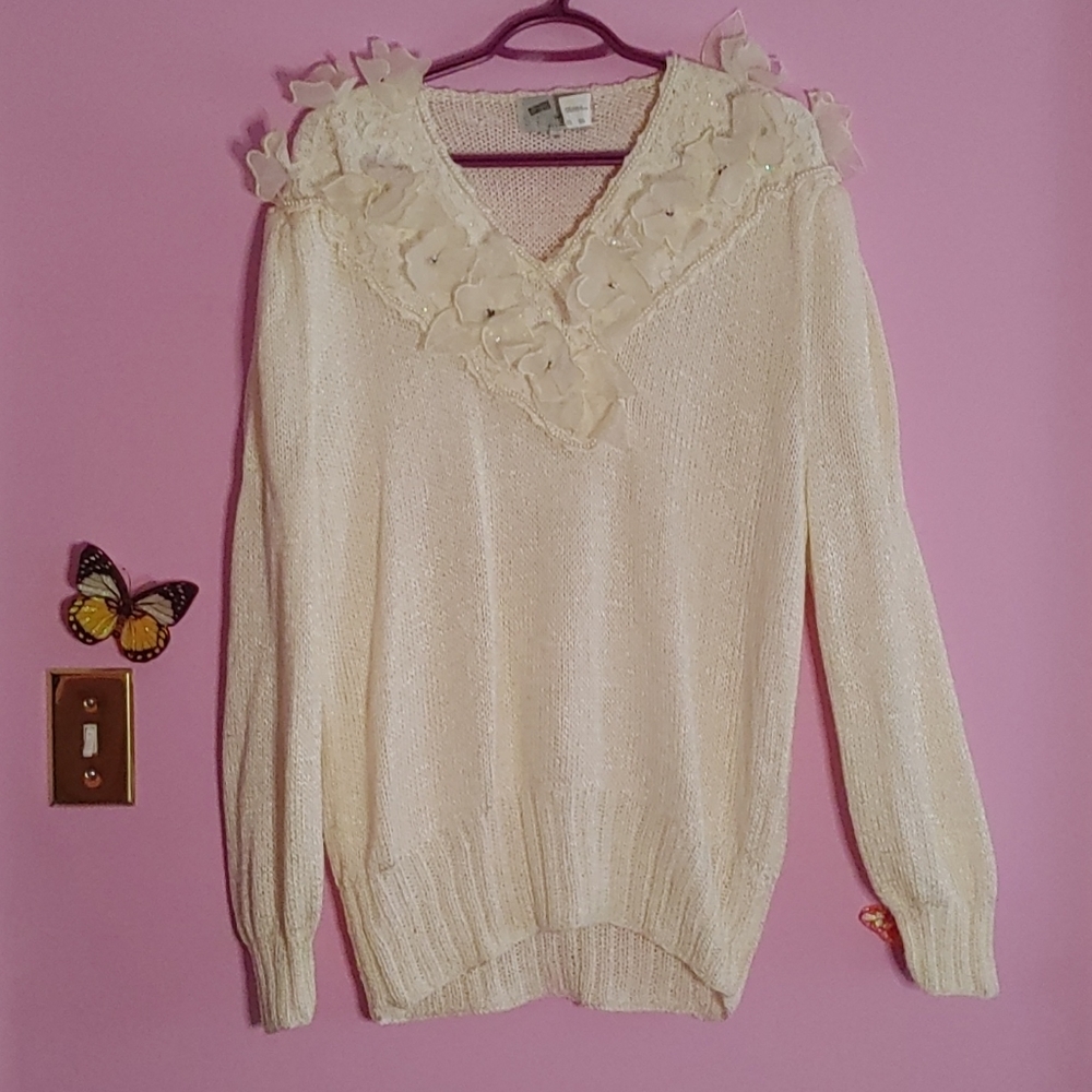 Vintage sweater with flower embellishment